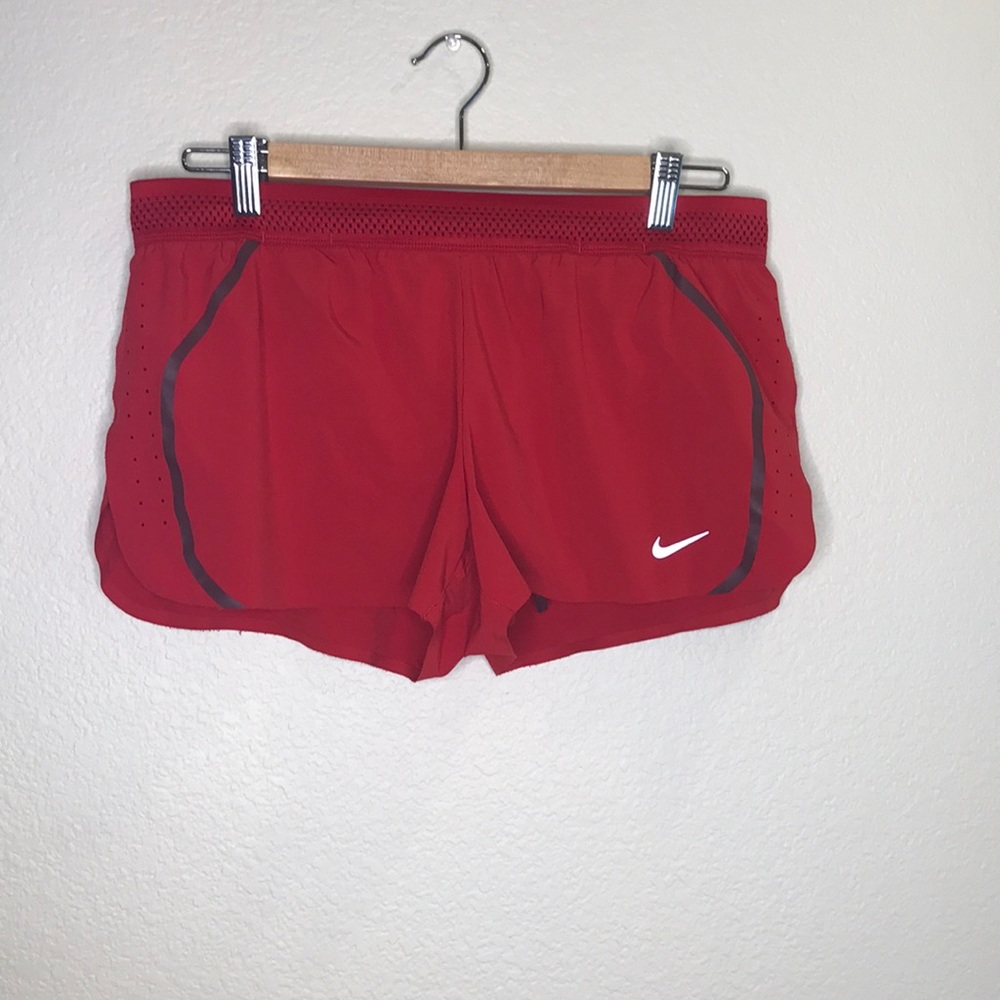 Red Nike shorts